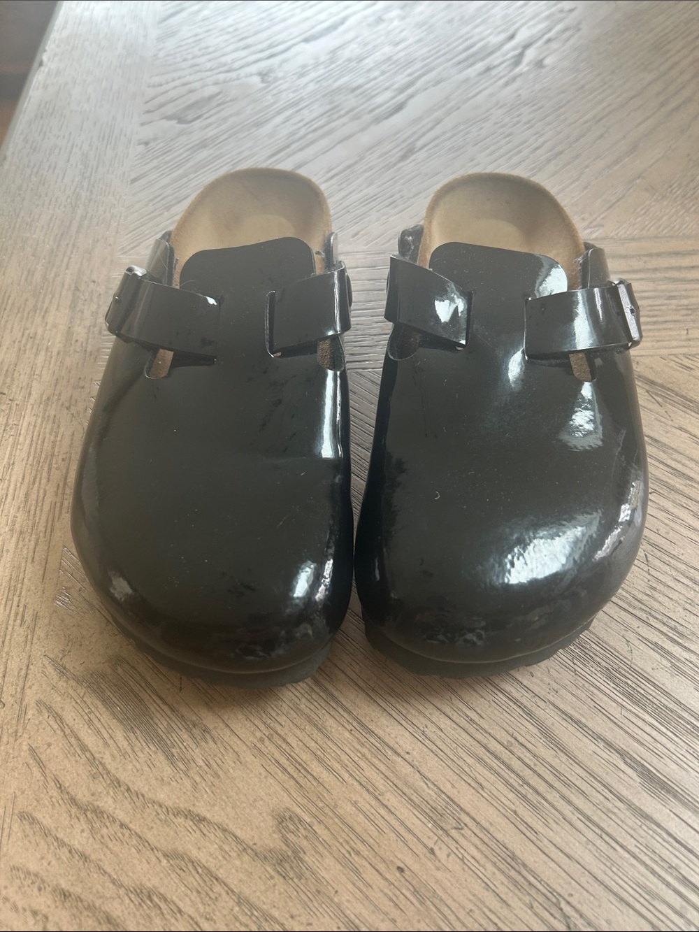 Birkenstock woman’s Glossy Black Slip-On Clog Sandals